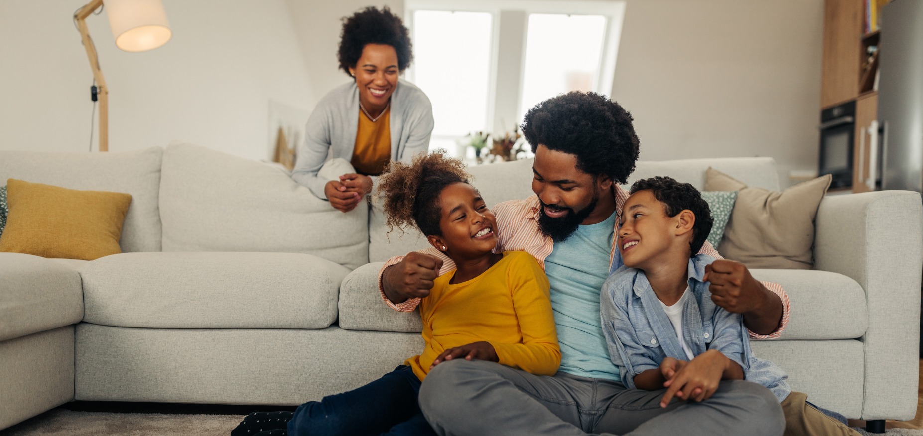 Family in the living room happy